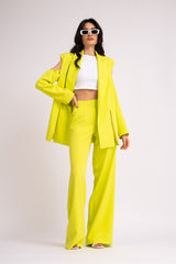 Lime suit with deconstructed shoulders blazer and wide leg trousers