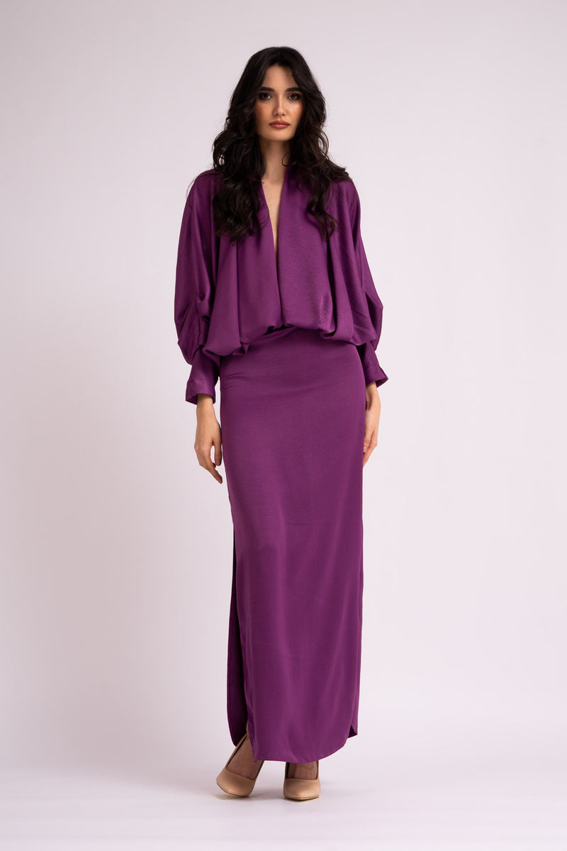 Deep purple dress with draped neckline and flared sleeve