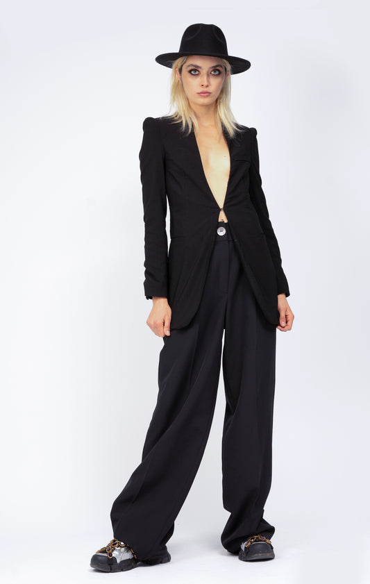 Black suit with sharped shoulders blazer