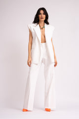 White suit with oversized vest and wide leg trousers