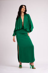 Emerald green draped dress with flared sleeves