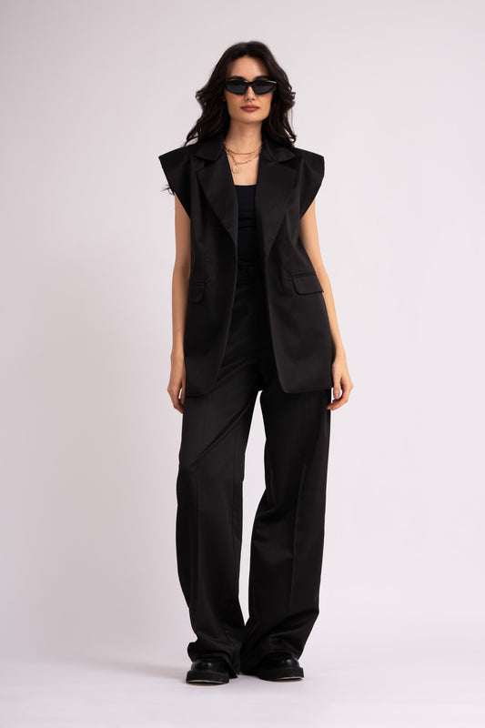 Black suit with oversized vest and wide leg trousers