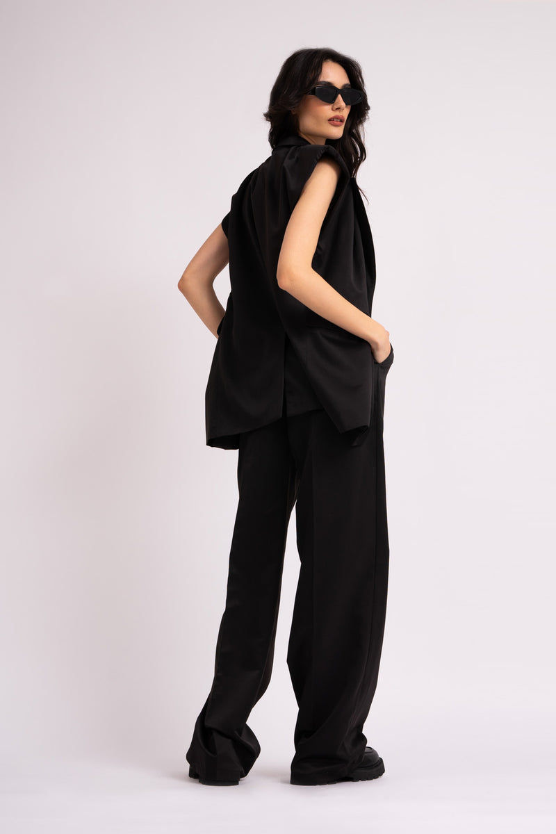 Black suit with oversized vest and wide leg trousers