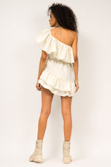 Asymmetrical dress with ruffle on a shoulder