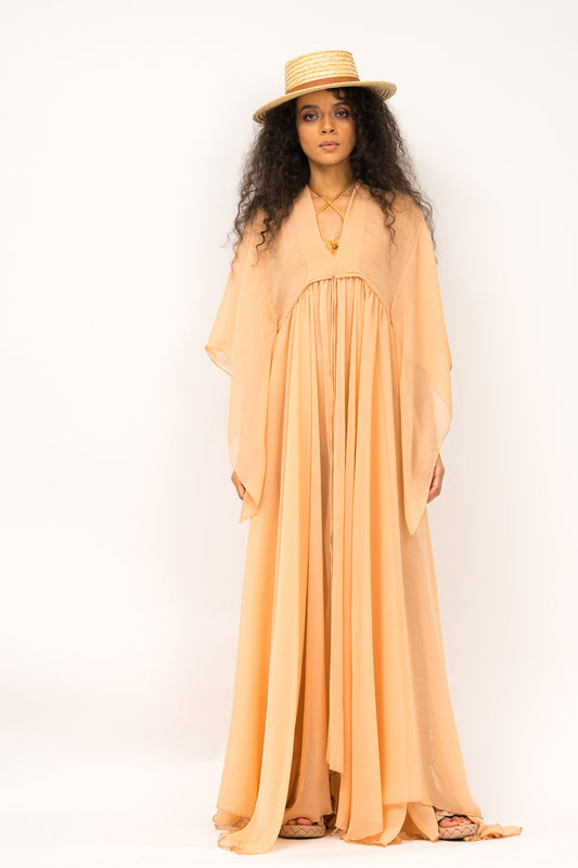 Flared kaftan with cord on the waistline