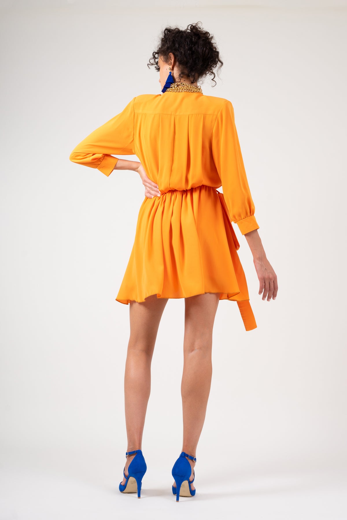 Orange dress with adjustable draping