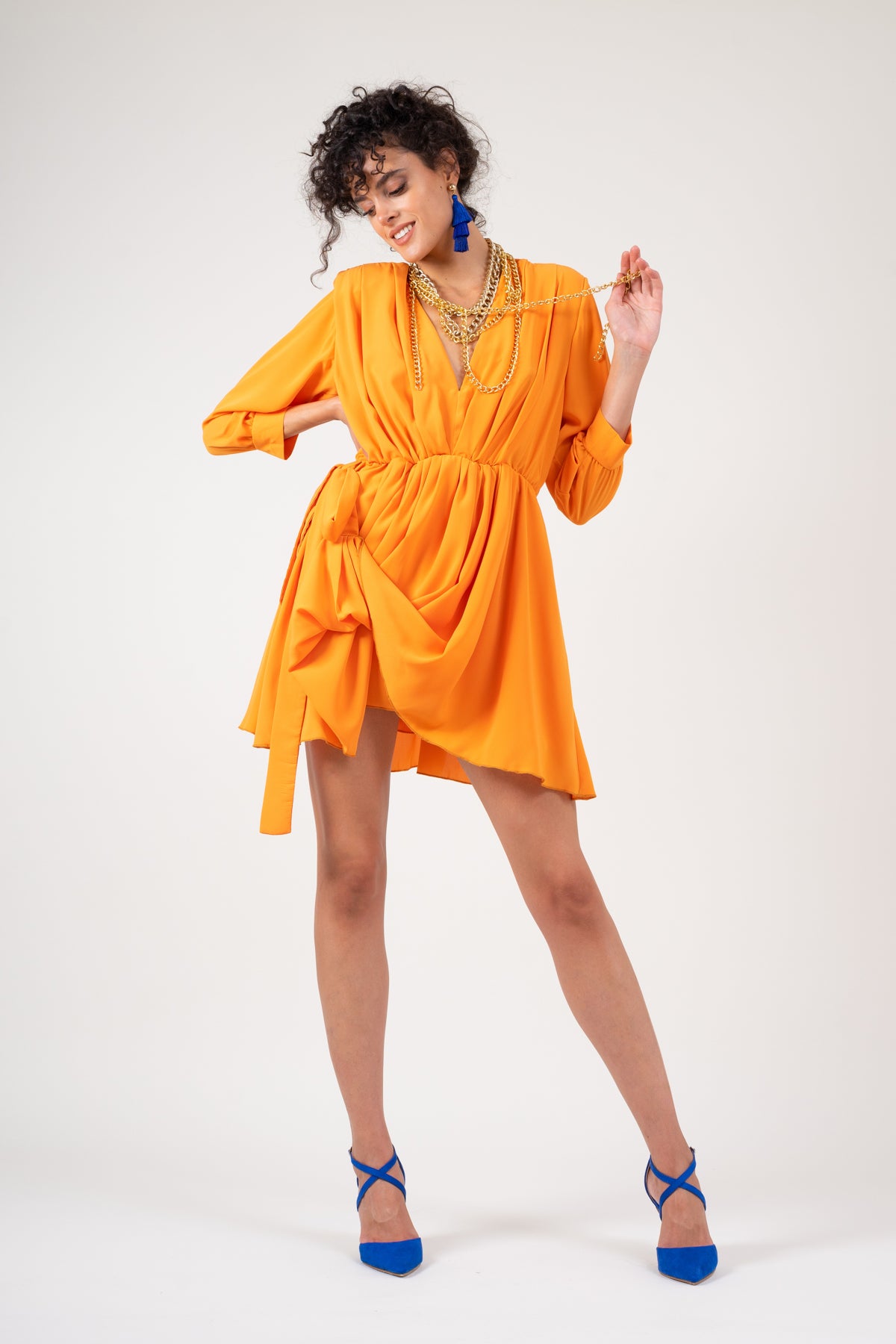 Orange dress with adjustable draping