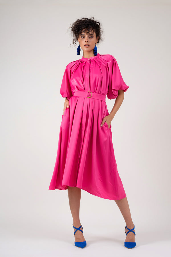 Neon pink dress with raglan sleeve and pleats