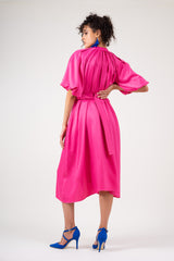 Neon pink dress with raglan sleeve and pleats