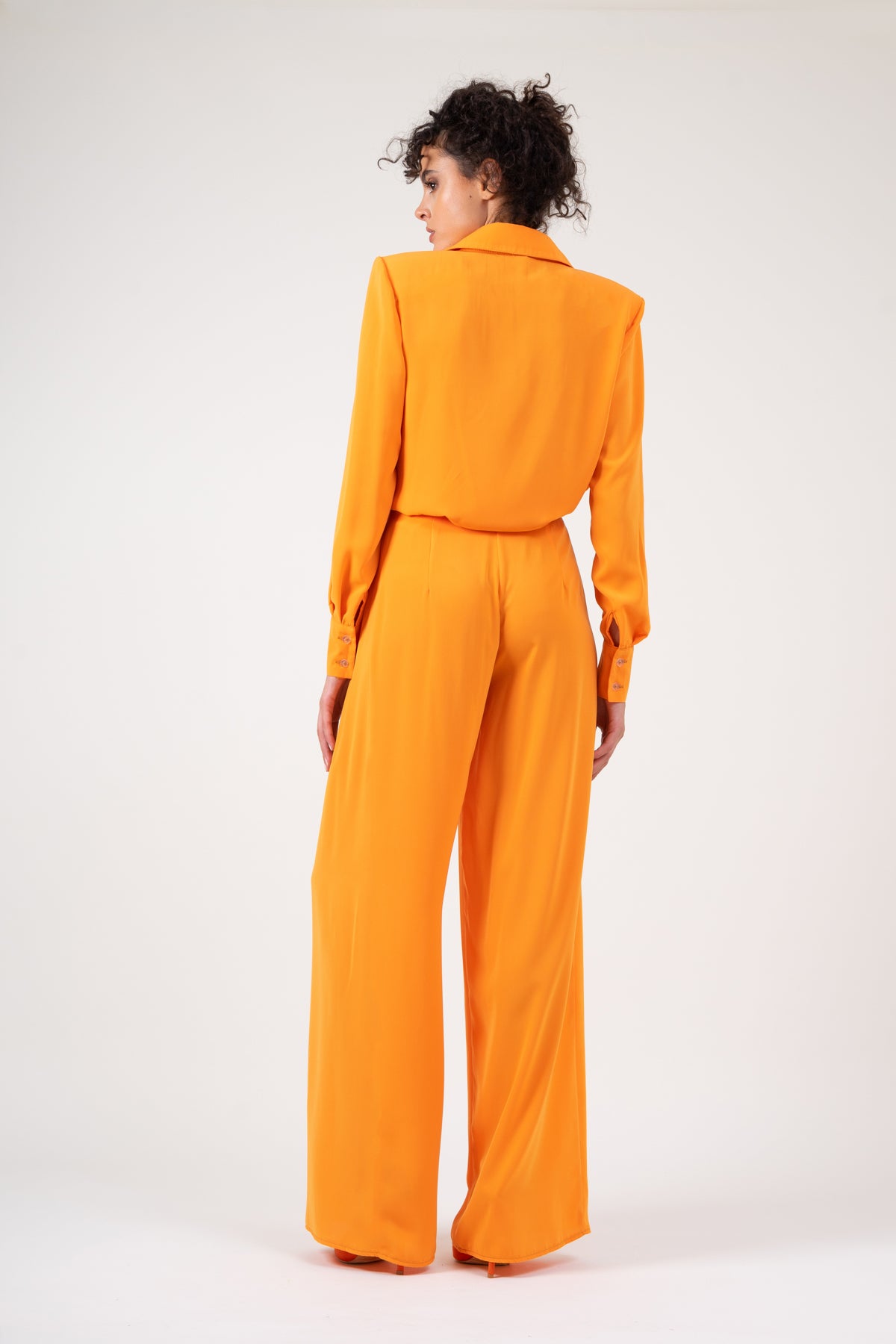 Orange shirt with oversized shoulders