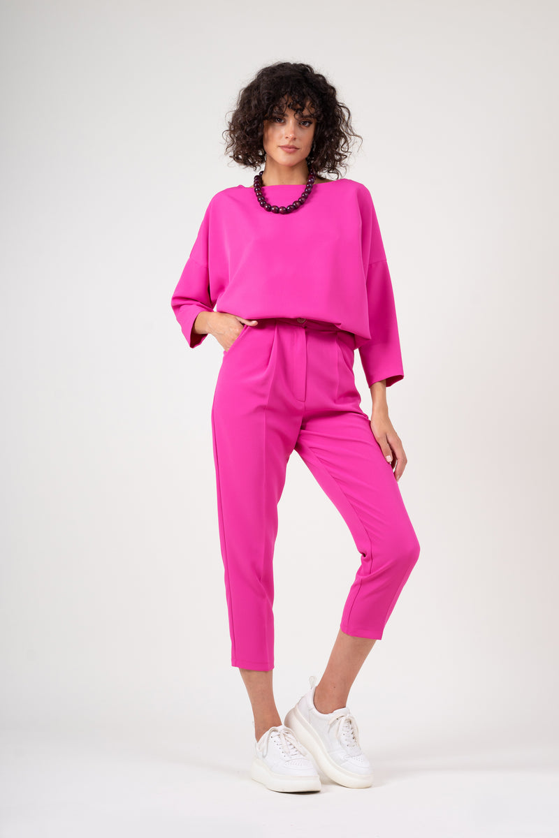 Neon pink set with blouse and cropped trousers
