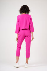 Neon pink set with blouse and cropped trousers
