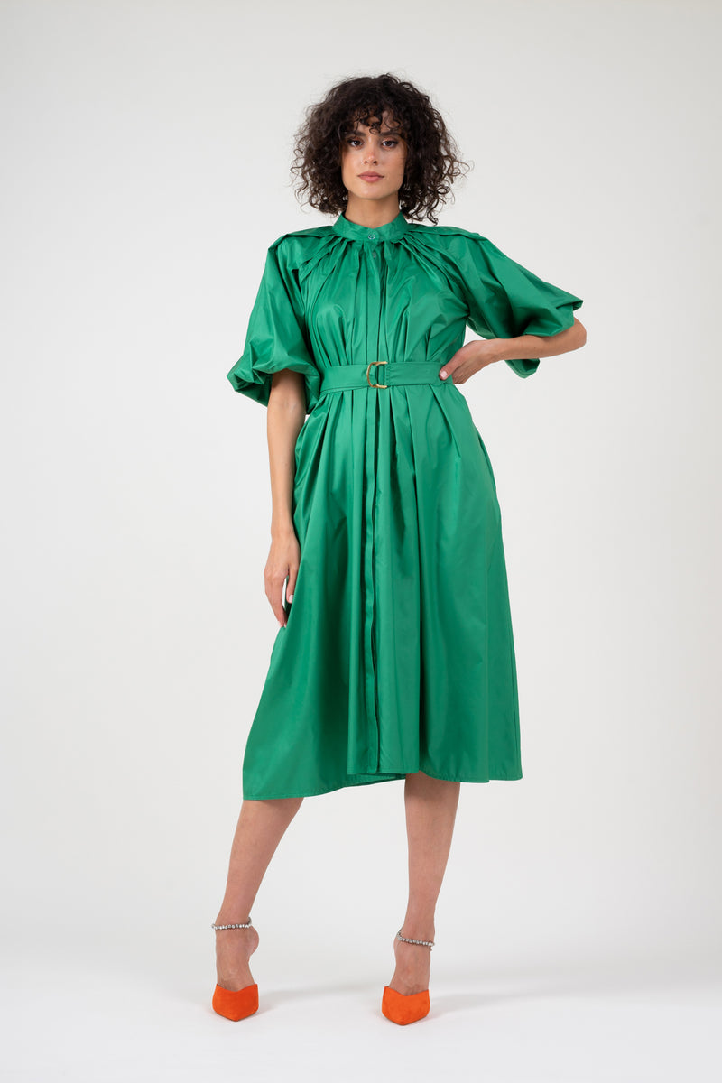 Green dress with raglan sleeve and pleats