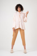 Nude chiffon blouse with draped shoulders & bow ribbon