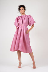 Pastel pink dress with raglan sleeve and pleats