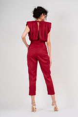 Red draped jumspuit with conical trousers