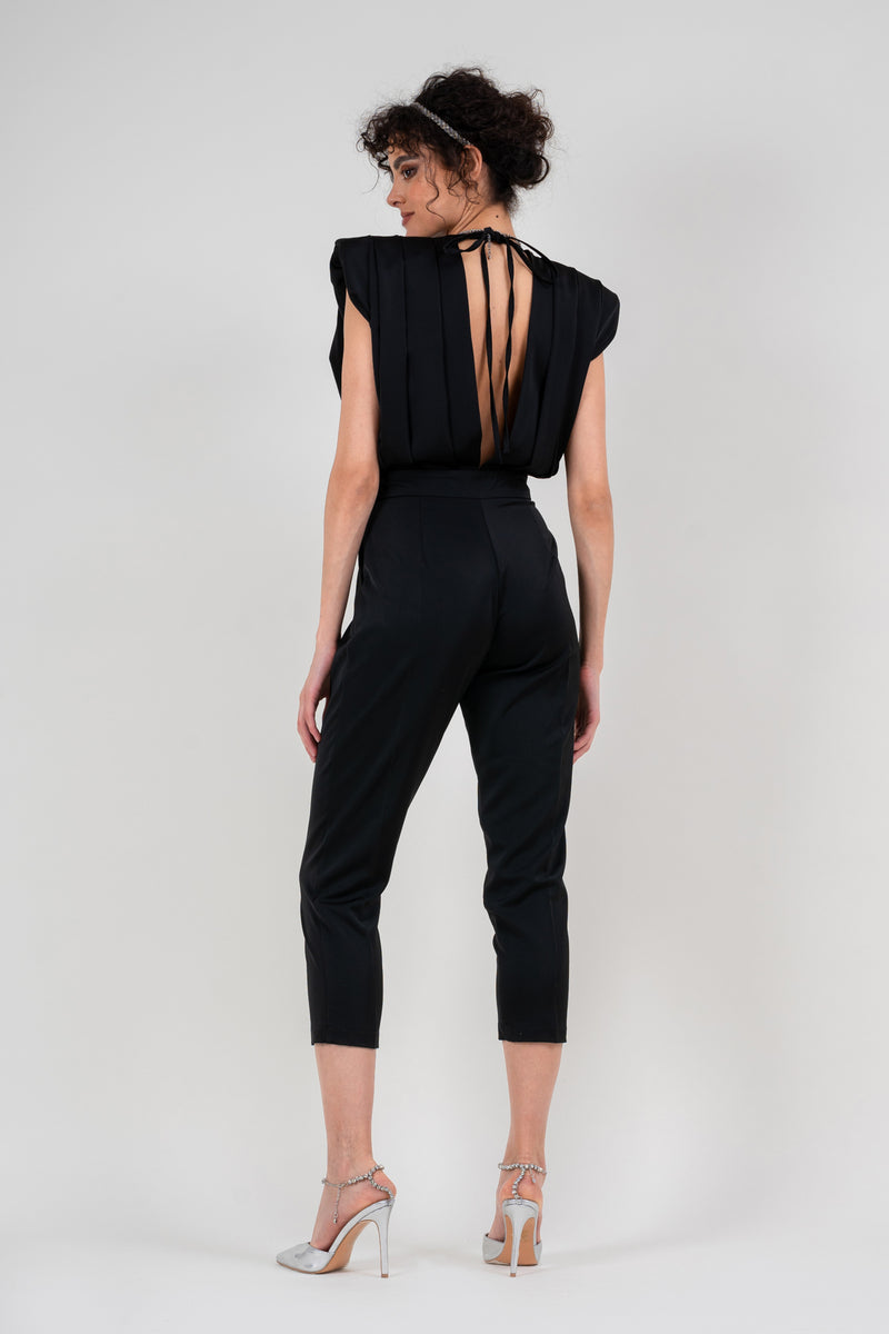 Black draped jumspuit with conical trousers