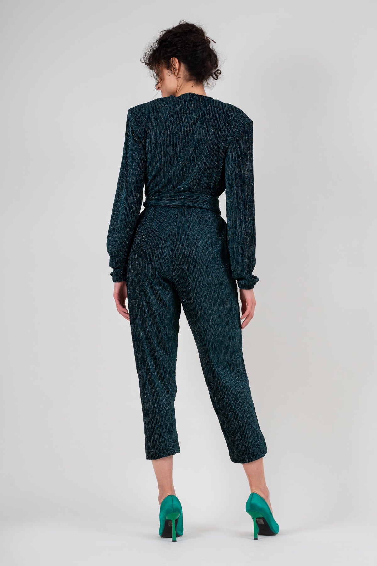 Emerald green jumpsuit with silver inserts