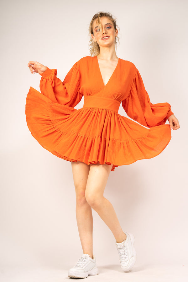 Orange dress with flared sleeves