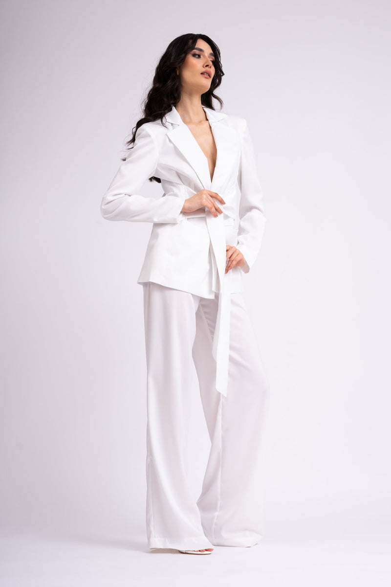 White suit with blazer with scarves and wide leg pants