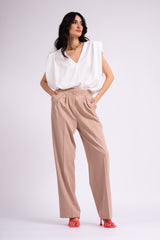 Beige wide leg trousers with assymetrical waistband