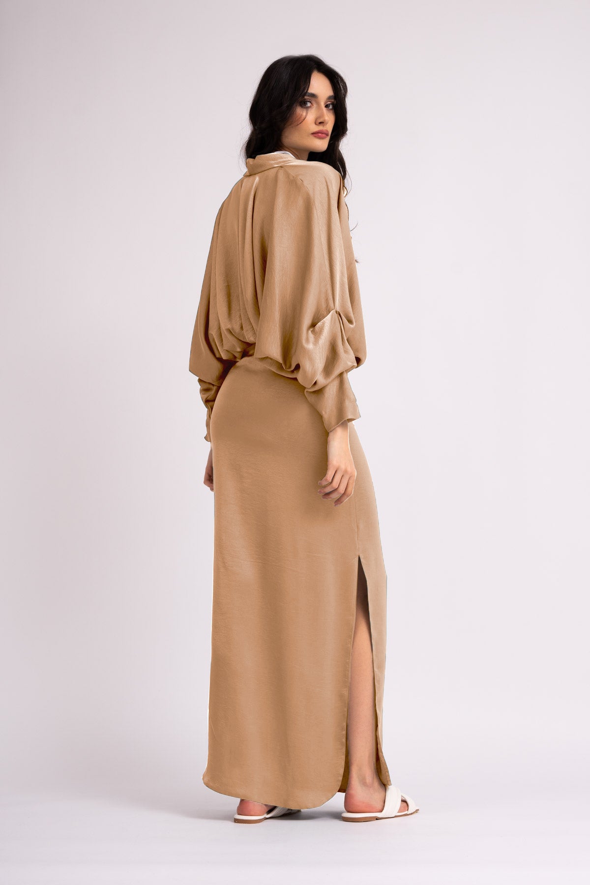 Beige dress with draped neckline and flared sleeve